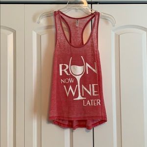 Faded red/pink tank top.